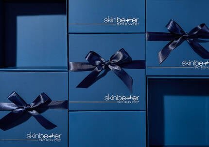 Advent Calendar - Daily Offer Awaits​. Blue presents on a dark blue background.